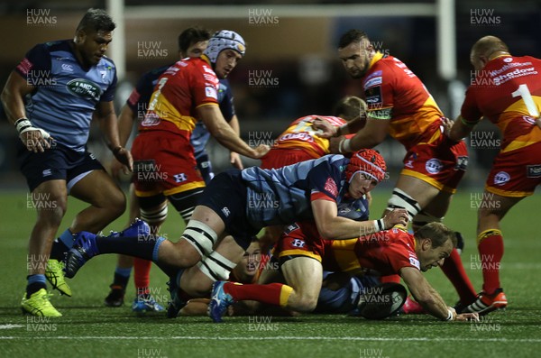 061017 - Cardiff Blues v Dragons Rugby - Guinness PRO14 - Seb Davies of Cardiff Blues takes out Sarel Pretorius of Dragons