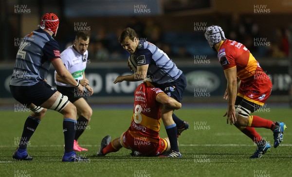 061017 - Cardiff Blues v Dragons Rugby - Guinness PRO14 - Jarrod Evans of Cardiff Blues is tackled by James Benjamin of Dragons