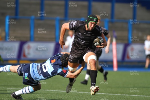 070919 - Cardiff Blues A v Dragons A - Celtic Cup -  Ollie Griffiths of Dragons A is tackled by Ioan Davies of Cardiff Blues A 