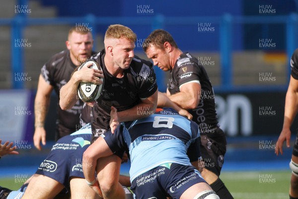 070919 - Cardiff Blues A v Dragons A - Celtic Cup -  Jack Dixon of Dragons A is tackled by Alun Laurence of Cardiff Blues A