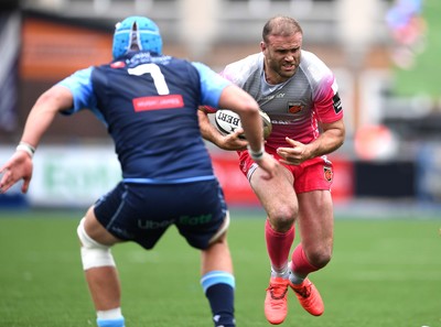 090521 - Cardiff Blues v Dragons - Guinness PRO14 Rainbow Cup - Jamie Roberts of Dragons takes on Olly Robinson of Cardiff Blues