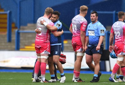 090521 - Cardiff Blues v Dragons - Guinness PRO14 Rainbow Cup - Aaron Wainwright of Dragons and Willis Halaholo of Cardiff Blues at the end of the game