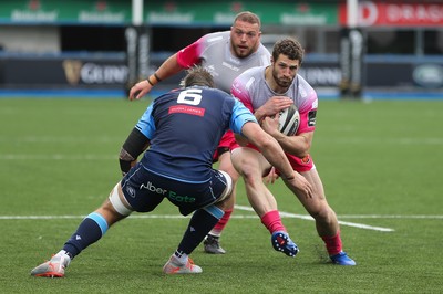 090521 - Cardiff Blues v Dragons, Guinness PRO14 Rainbow Cup - Jonah Holmes of Dragons takes on Josh Turnbull of Cardiff Blues