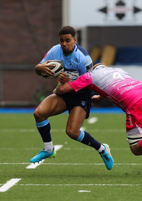 090521 - Cardiff Blues v Dragons, Guinness PRO14 Rainbow Cup - Ben Thomas of Cardiff Blues is tackled by Joe Davies of Dragons