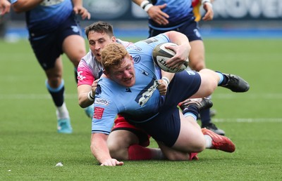 090521 - Cardiff Blues v Dragons, Guinness PRO14 Rainbow Cup - Rhys Carre of Cardiff Blues is brought down by Sam Davies of Dragons