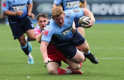 090521 - Cardiff Blues v Dragons, Guinness PRO14 Rainbow Cup - Rhys Carre of Cardiff Blues is brought down by Sam Davies of Dragons