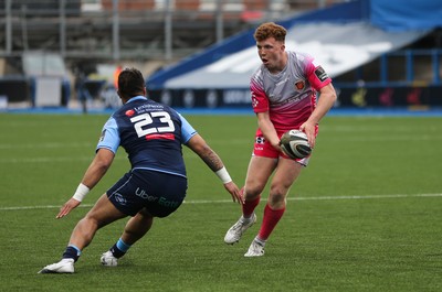 090521 - Cardiff Blues v Dragons, Guinness PRO14 Rainbow Cup - Aneurin Owen of Dragons takes on Willis Halaholo of Cardiff Blues