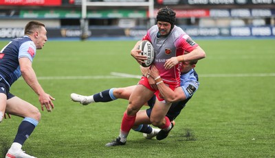 090521 - Cardiff Blues v Dragons, Guinness PRO14 Rainbow Cup - Ioan Davies of Dragons is tackled by Hallam Amos of Cardiff Blues just short of the try line