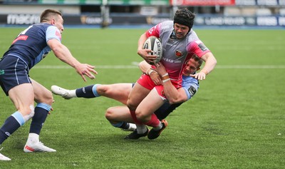 090521 - Cardiff Blues v Dragons, Guinness PRO14 Rainbow Cup - Ioan Davies of Dragons is tackled by Hallam Amos of Cardiff Blues just short of the try line