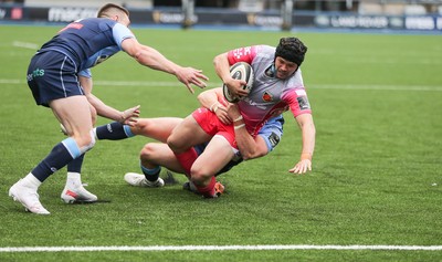 090521 - Cardiff Blues v Dragons, Guinness PRO14 Rainbow Cup - Ioan Davies of Dragons is tackled by Hallam Amos of Cardiff Blues just short of the try line