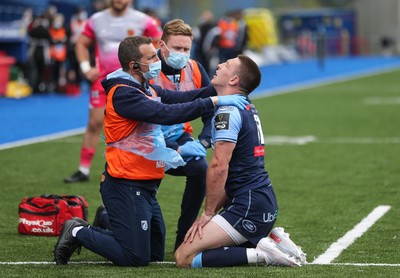 090521 - Cardiff Blues v Dragons, Guinness PRO14 Rainbow Cup - Josh Adams of Cardiff Blues receives treatment after taking a knock