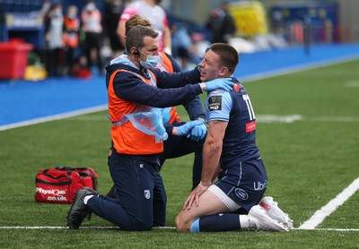 090521 - Cardiff Blues v Dragons, Guinness PRO14 Rainbow Cup - Josh Adams of Cardiff Blues receives treatment after taking a knock