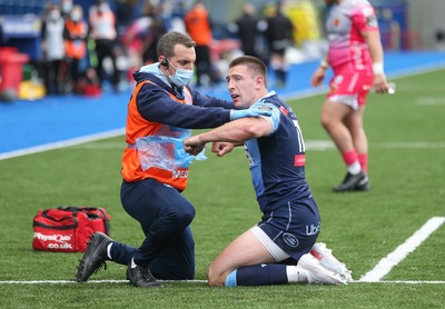 090521 - Cardiff Blues v Dragons, Guinness PRO14 Rainbow Cup - Josh Adams of Cardiff Blues receives treatment after taking a knock