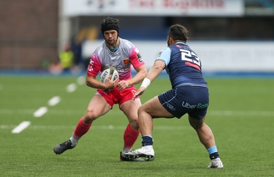 090521 - Cardiff Blues v Dragons, Guinness PRO14 Rainbow Cup - Ioan Davies of Dragons takes on Willis Halaholo of Cardiff Blues