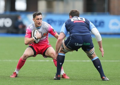 090521 - Cardiff Blues v Dragons, Guinness PRO14 Rainbow Cup - Sam Davies of Dragons takes on James Ratti of Cardiff Blues