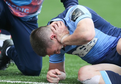 090521 - Cardiff Blues v Dragons, Guinness PRO14 Rainbow Cup - Josh Adams of Cardiff Blues goes down after taking a knock