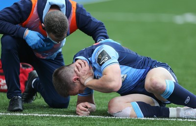 090521 - Cardiff Blues v Dragons, Guinness PRO14 Rainbow Cup - Josh Adams of Cardiff Blues goes down after taking a knock