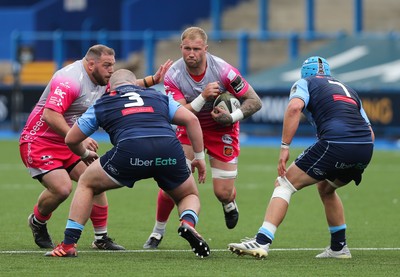 090521 - Cardiff Blues v Dragons, Guinness PRO14 Rainbow Cup - Ross Moriarty of Dragons charges at Dillon Lewis of Cardiff Blues and Olly Robinson of Cardiff Blues