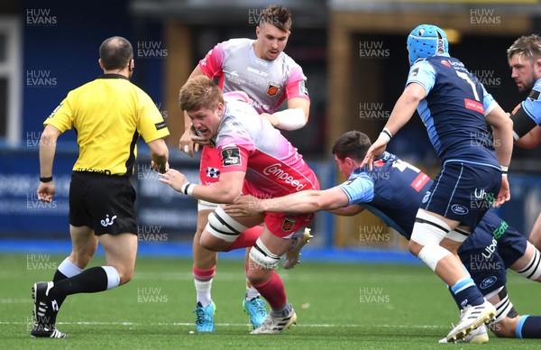 090521 - Cardiff Blues v Dragons - Guinness PRO14 Rainbow Cup - Matthew Screech of Dragons is tackled by Seb Davies of Cardiff Blues