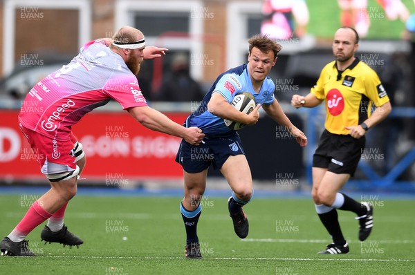 090521 - Cardiff Blues v Dragons - Guinness PRO14 Rainbow Cup - Jarrod Evans of Cardiff Blues is tackled by Joe Davies of Dragons
