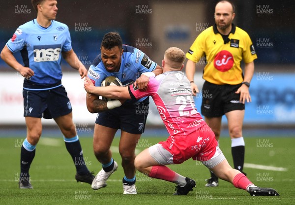 090521 - Cardiff Blues v Dragons - Guinness PRO14 Rainbow Cup - Willis Halaholo of Cardiff Blues is tackled by Dan Babos of Dragons