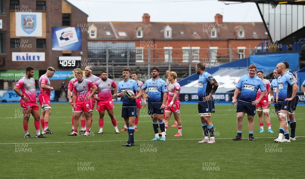 090521 - Cardiff Blues v Dragons, Guinness PRO14 Rainbow Cup - Players from both teams look on as referee Mike Adamson refers to the big screen while conferring with the TMO