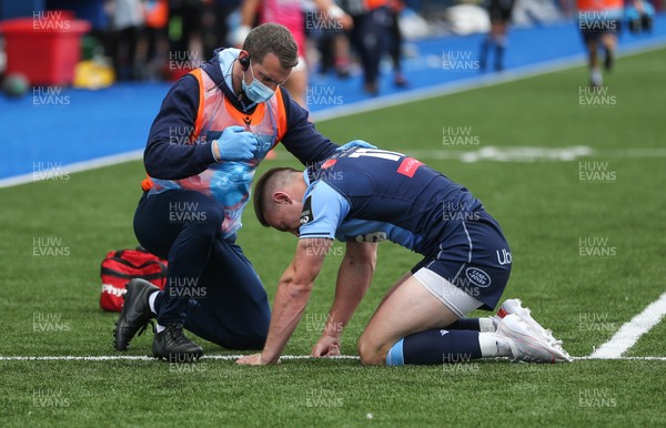 090521 - Cardiff Blues v Dragons, Guinness PRO14 Rainbow Cup - Josh Adams of Cardiff Blues receives treatment after taking a knock
