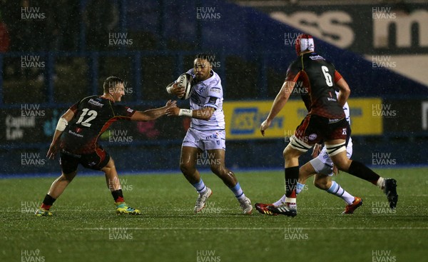 211218 - Cardiff Blues v Dragons - Guinness PRO14 - Willis Halaholo of Cardiff Blues is tackled by Jarryd Sage of Dragons