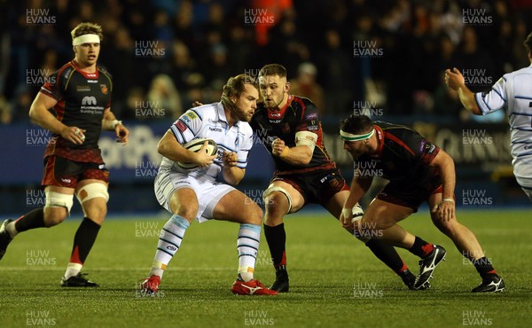 211218 - Cardiff Blues v Dragons - Guinness PRO14 - Kristian Dacey of Cardiff Blues is challenged by Harri Keddie of Dragons