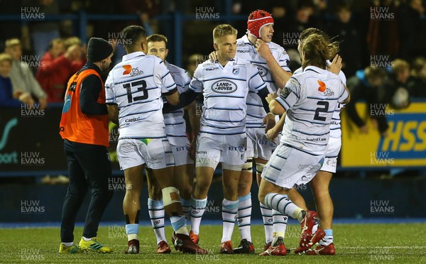211218 - Cardiff Blues v Dragons - Guinness PRO14 - Gareth Anscombe of Cardiff Blues celebrates with team mates after kicking the winning penalty