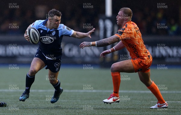 261219 - Cardiff Blues v Dragons - Guinness PRO14 - Jarrod Evans of Cardiff Blues gets past Ross Moriarty of Dragons