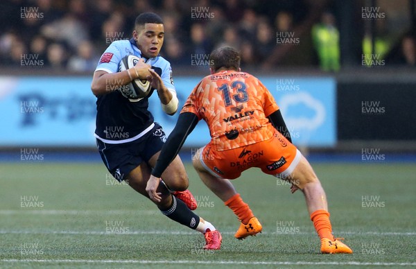 261219 - Cardiff Blues v Dragons - Guinness PRO14 - Ben Thomas of Cardiff Blues is tackled by Tyler Morgan of Dragons