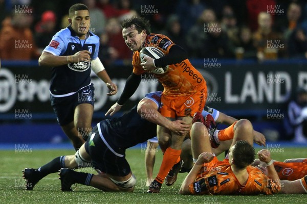 261219 - Cardiff Blues v Dragons - Guinness PRO14 - Rhodri Williams of Dragons is tackled by Shane Lewis-Hughes of Cardiff Blues