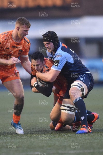 261219 - Cardiff Blues v Dragons - Guinness PRO14 - Sam Davies of Dragons  is tackled by James Ratti of Cardiff Blues 