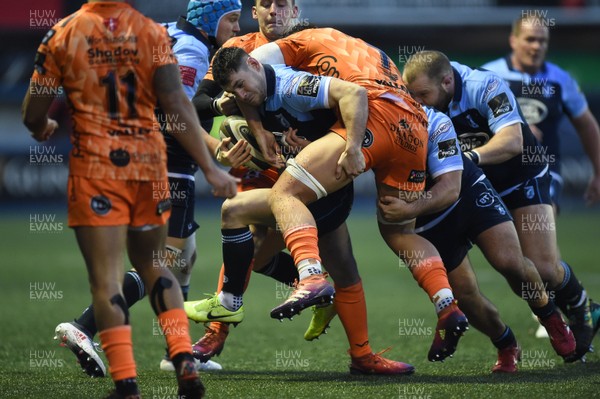 261219 - Cardiff Blues v Dragons - Guinness PRO14 - Tomos Williams of Cardiff Blues  is tackled by Taine Basham of Dragons 