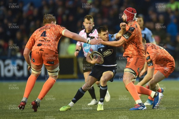 261219 - Cardiff Blues v Dragons - Guinness PRO14 - Tomos Williams of Cardiff Blues is tackled by Cory Hill of Dragons 