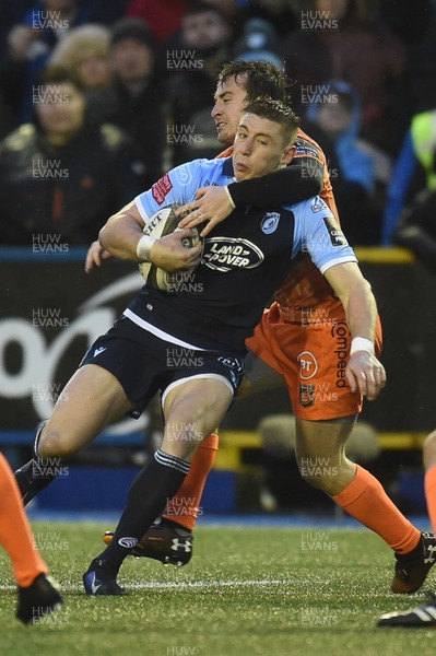261219 - Cardiff Blues v Dragons - Guinness PRO14 - Josh Adams of Cardiff Blues is tackled by Rhodri Williams of Dragons 