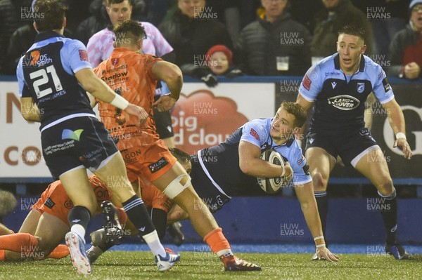 261219 - Cardiff Blues v Dragons - Guinness PRO14 - Hallam Amos of Cardiff Blues  is tackled by Sam Davies of Dragons 