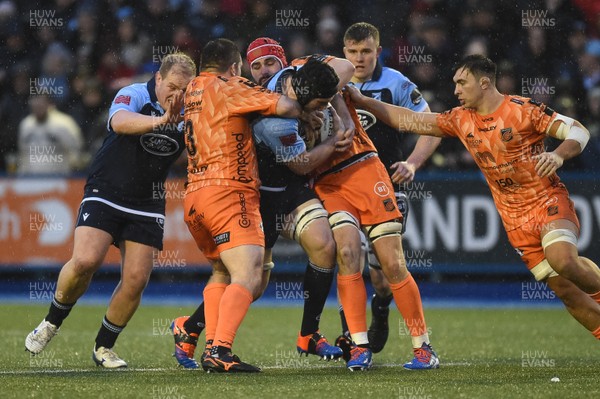 261219 - Cardiff Blues v Dragons - Guinness PRO14 - James Ratti of Cardiff Blues is tackled by Aaron Jarvis of Dragons  and Cory Hill of Dragons 
