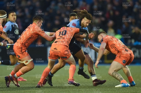 261219 - Cardiff Blues v Dragons - Guinness PRO14 - Josh Navidi of Cardiff Blues is tackled by Sam Davies of Dragons  and Jack Dixon of Dragons 