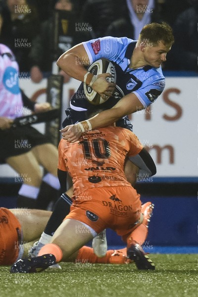 261219 - Cardiff Blues v Dragons - Guinness PRO14 - Hallam Amos of Cardiff Blues  is tackled by Sam Davies of Dragons 