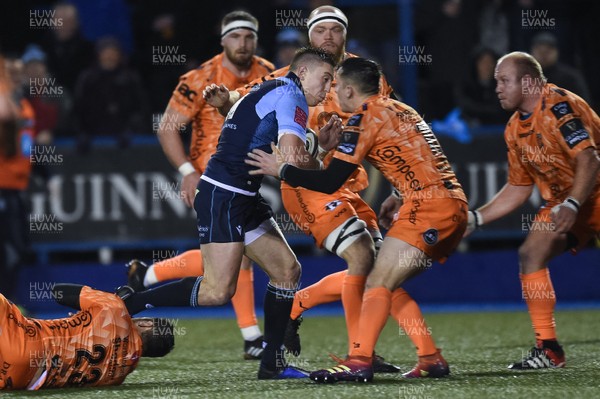 261219 - Cardiff Blues v Dragons - Guinness PRO14 - Josh Adams of Cardiff Blues is tackled by Sam Davies of Dragons 