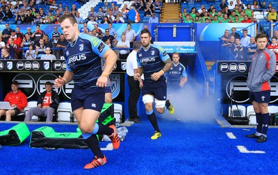 290815 - Cardiff Blues v Newport Gwent Dragons - Preseason friendly - Sam Hobbs and Josh Turnbull of Cardiff Blues run out in the new strip