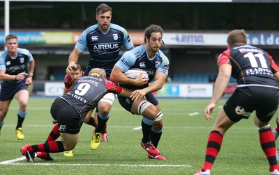 290815 - Cardiff Blues v Newport Gwent Dragons - Preseason friendly - Josh Navidi of Cardiff Blues is tackled by Sarel Pretorius of Dragons