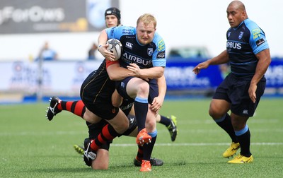 290815 - Cardiff Blues v Newport Gwent Dragons - Preseason friendly - Ethan Lewis of Cardiff Blues is tackled by Philip Price and Shaun Knight of Dragons