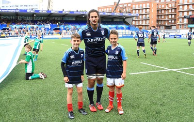 290815 - Cardiff Blues v Newport Gwent Dragons - Preseason friendly - Cardiff Blues mascots Morgan Parry Williams and Henri Parry Williams with captain Josh Navidi