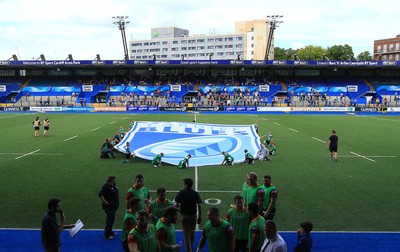 290815 - Cardiff Blues v Newport Gwent Dragons - Preseason friendly - bearers display the banner at Cardiff Blues