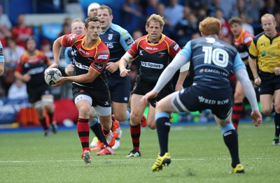 290815 - Cardiff Blues v Newport Gwent Dragons, Pre-Season Friendly -Jason Tovey of Newport Gwent Dragons takes on Rhys Patchell of Cardiff Blues