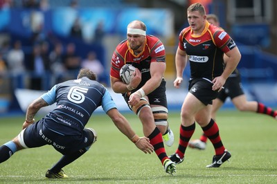 290815 - Cardiff Blues v Newport Gwent Dragons, Pre-Season Friendly -Rynard Landman of Newport Gwent Dragons takes on Josh Turnbull of Cardiff Blues