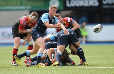 290815 - Cardiff Blues v Newport Gwent Dragons, Pre-Season Friendly -Tavis Knoyle of Cardiff Blues feeds the ball out